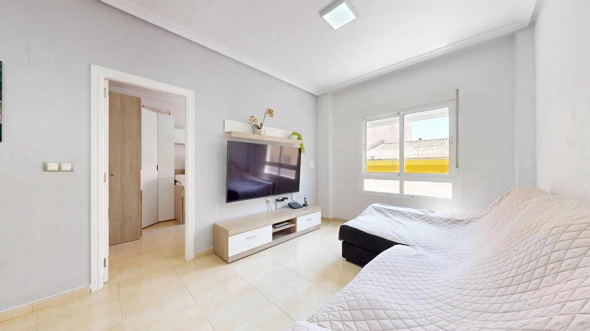 Sala d'estar de Apartament en venda en Los Montesinos amb Aire condicionat, Moblat i Piscina comunitària