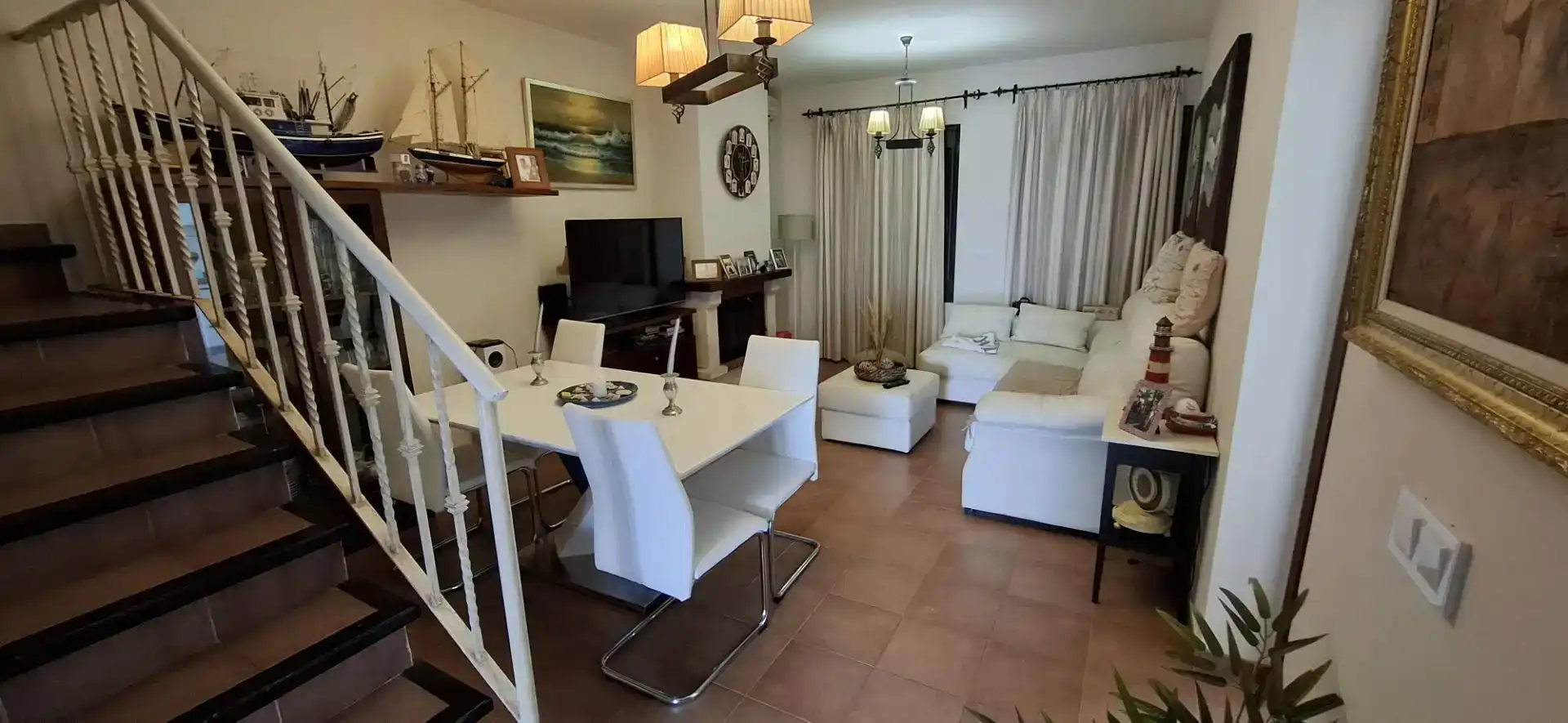 Sala d'estar de Casa adosada de lloguer en El Rompido amb Aire condicionat, Traster i Piscina