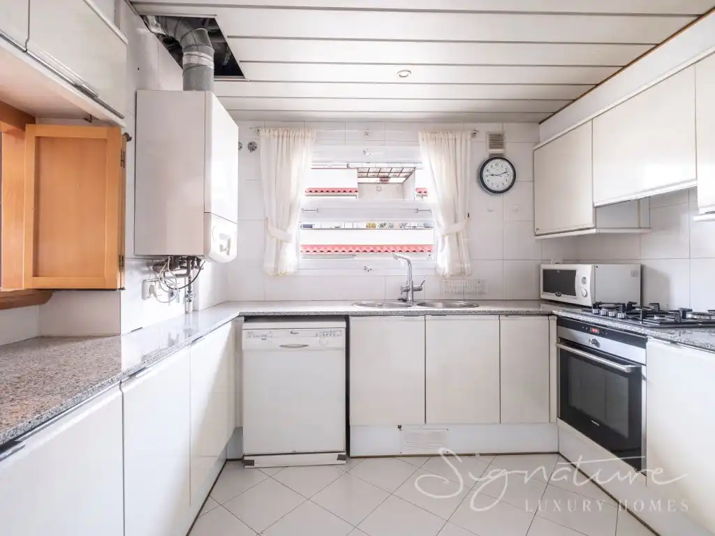 Kitchen of Attic for sale in Sant Cugat del Vallès  with Air Conditioner, Terrace and Swimming Pool