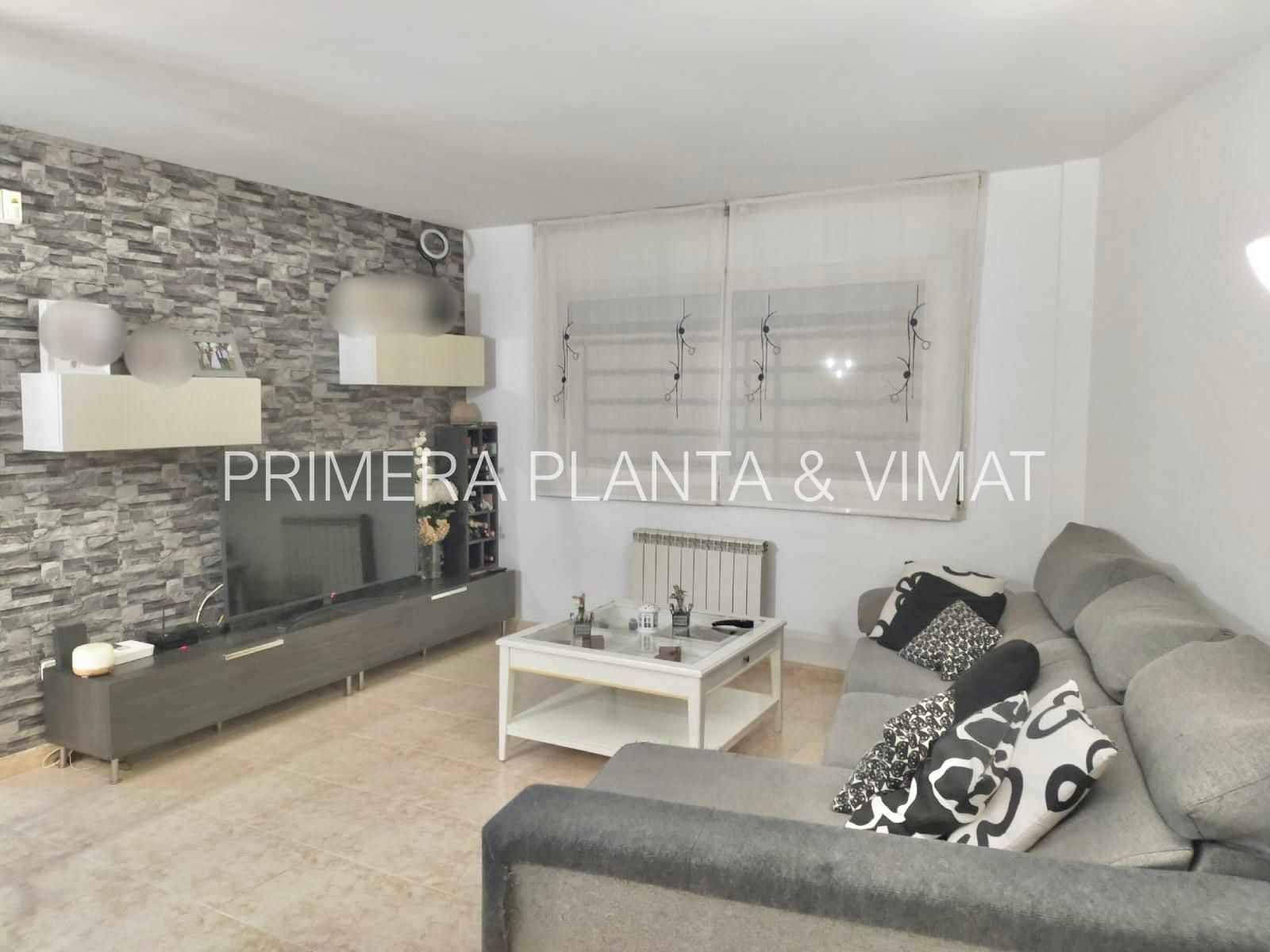 Living room of Planta baja for sale in Mataró  with Heating, Terrace and Alarm
