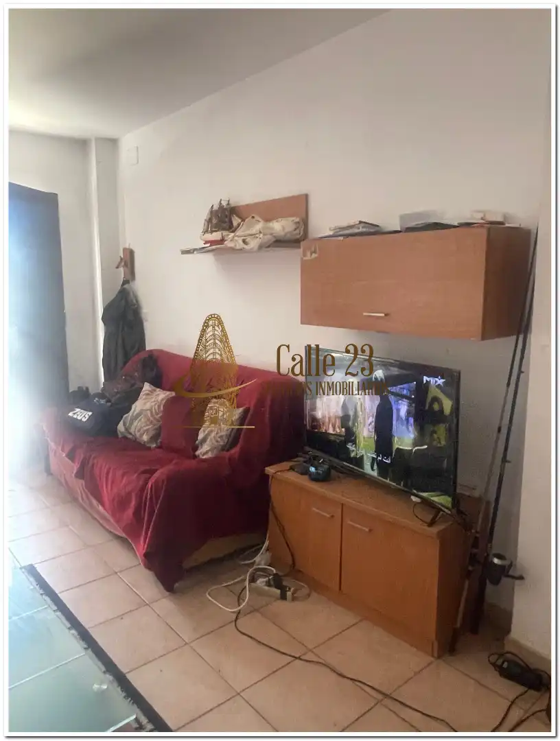 Sala de estar de Casa adosada en venta en San Juan del Puerto con Terraza