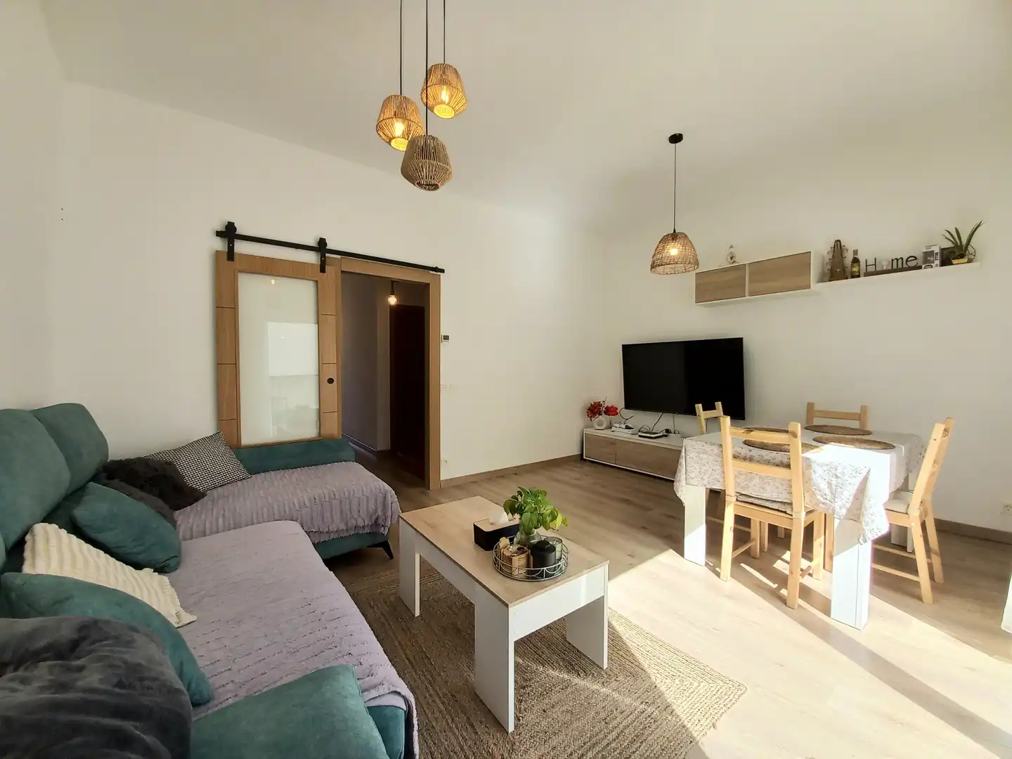 Sala d'estar de Casa adosada en venda en Modúbar de la Emparedada amb Calefacció, Jardí privat i Terrassa