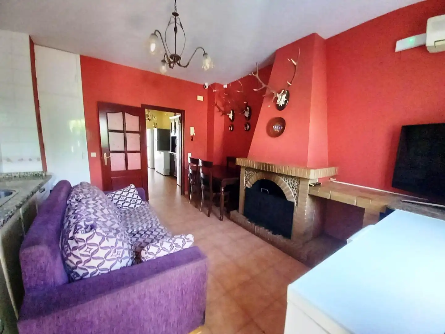 Living room of Houses for sale in El Pedroso  with Air Conditioner, Terrace and Storage room
