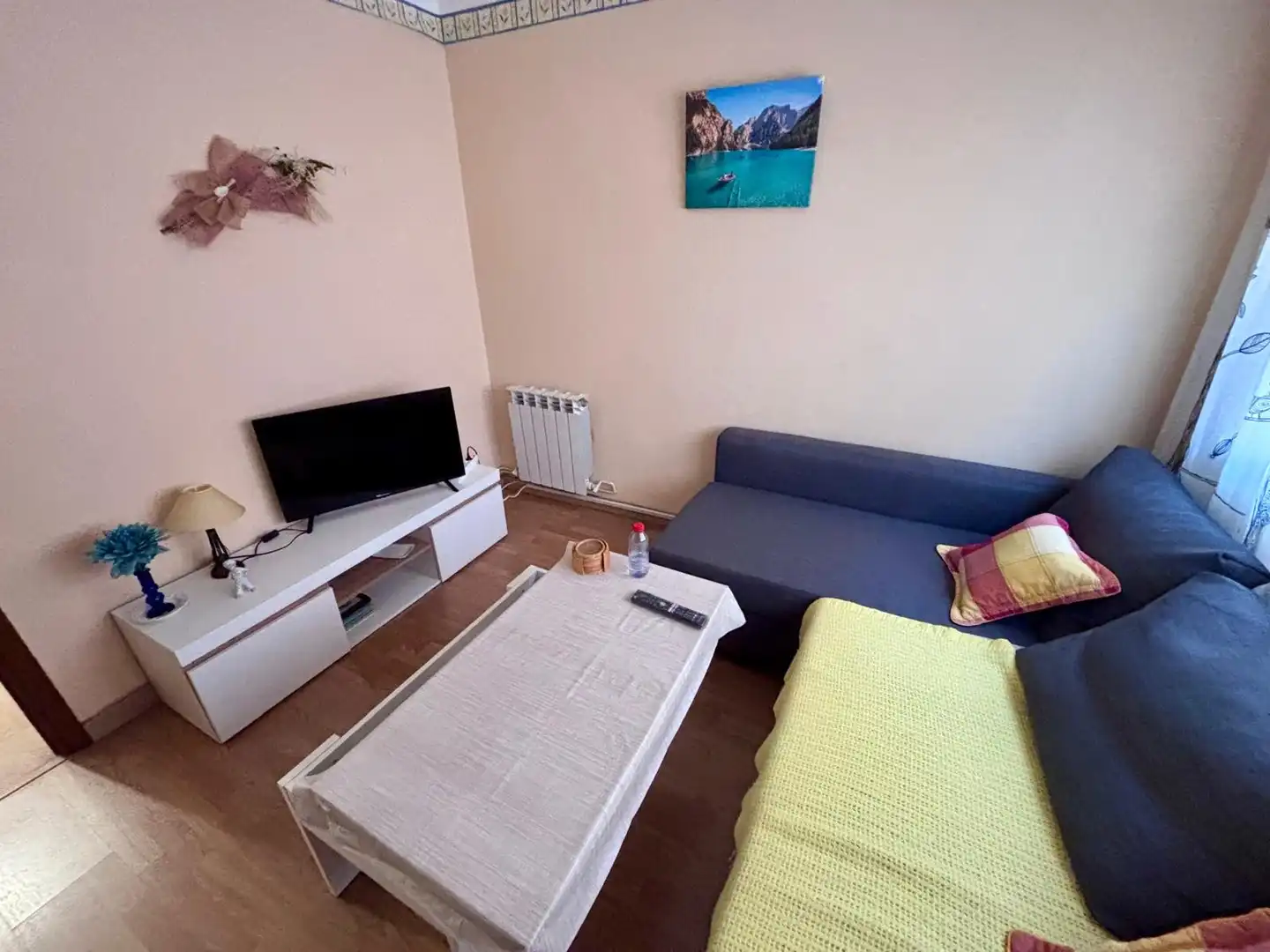 Sala de estar de Piso en venta en Gijón  con Calefacción, Parquet y Amueblado