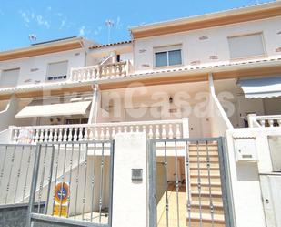 Exterior view of Single-family semi-detached for sale in Guardamar de la Safor  with Air Conditioner and Terrace