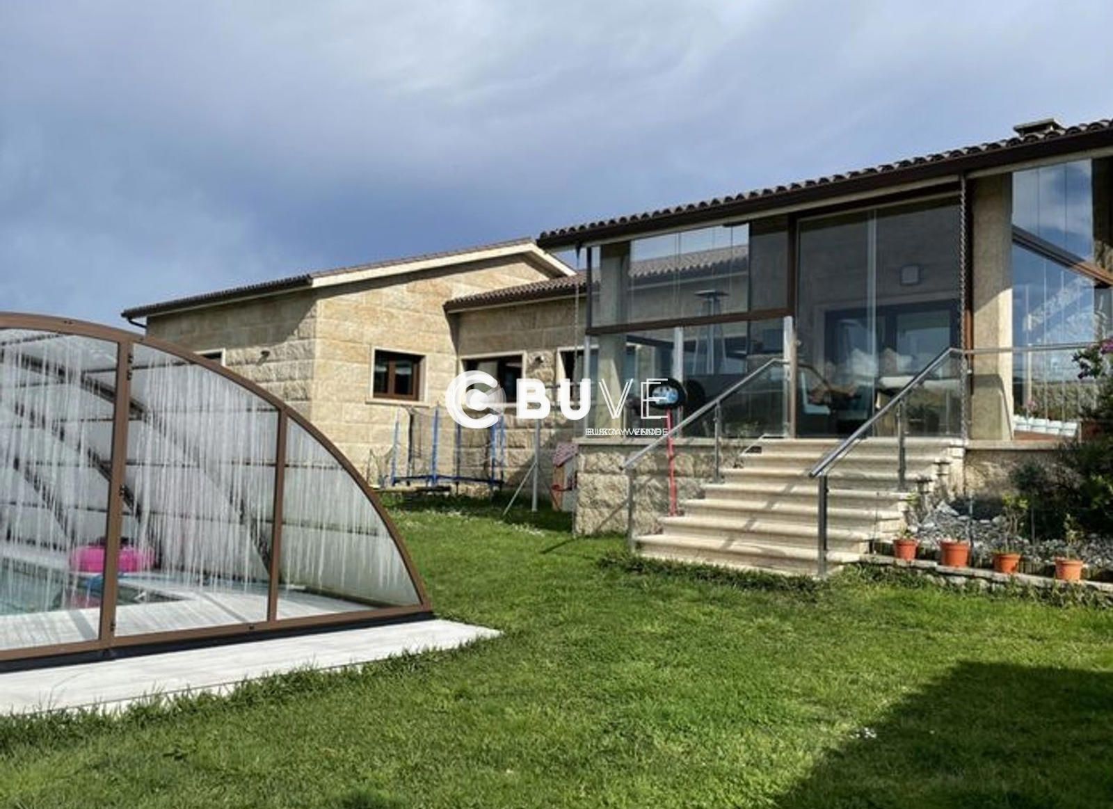 Vista exterior de Casa o xalet en venda en A Pobra do Caramiñal amb Aire condicionat, Calefacció i Terrassa