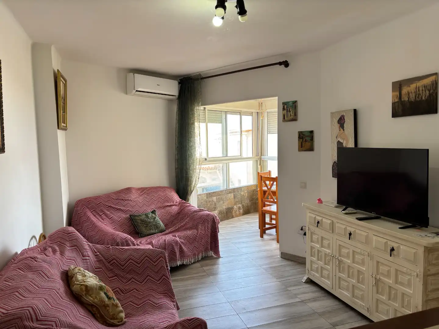 Sala d'estar de Apartament en venda en Torrox amb Aire condicionat, Terrassa i Moblat