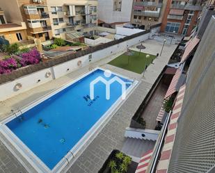 Swimming pool of Flat for sale in Badalona  with Air Conditioner, Heating and Terrace