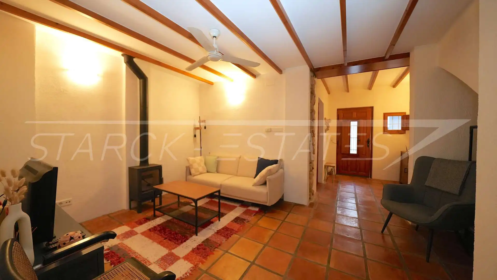 Sala de estar de Casa adosada en venta en Benidoleig