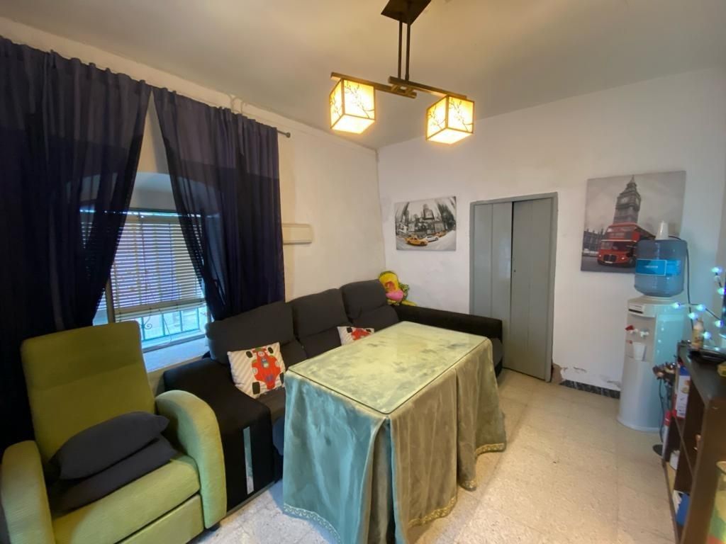Sala d'estar de Casa adosada en venda en Villanueva del Ariscal amb Traster