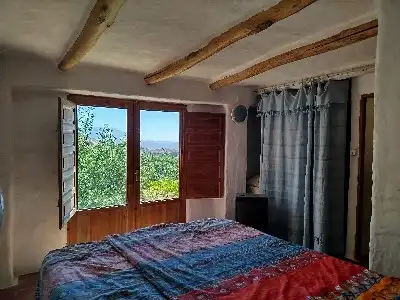 Dormitori de Finca rústica en venda en Alpujarra de la Sierra amb Calefacció, Jardí privat i Moblat