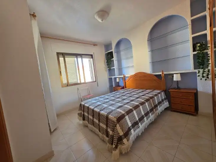 Dormitori de Casa adosada en venda en La Manga del Mar Menor amb Aire condicionat, Jardí privat i Terrassa