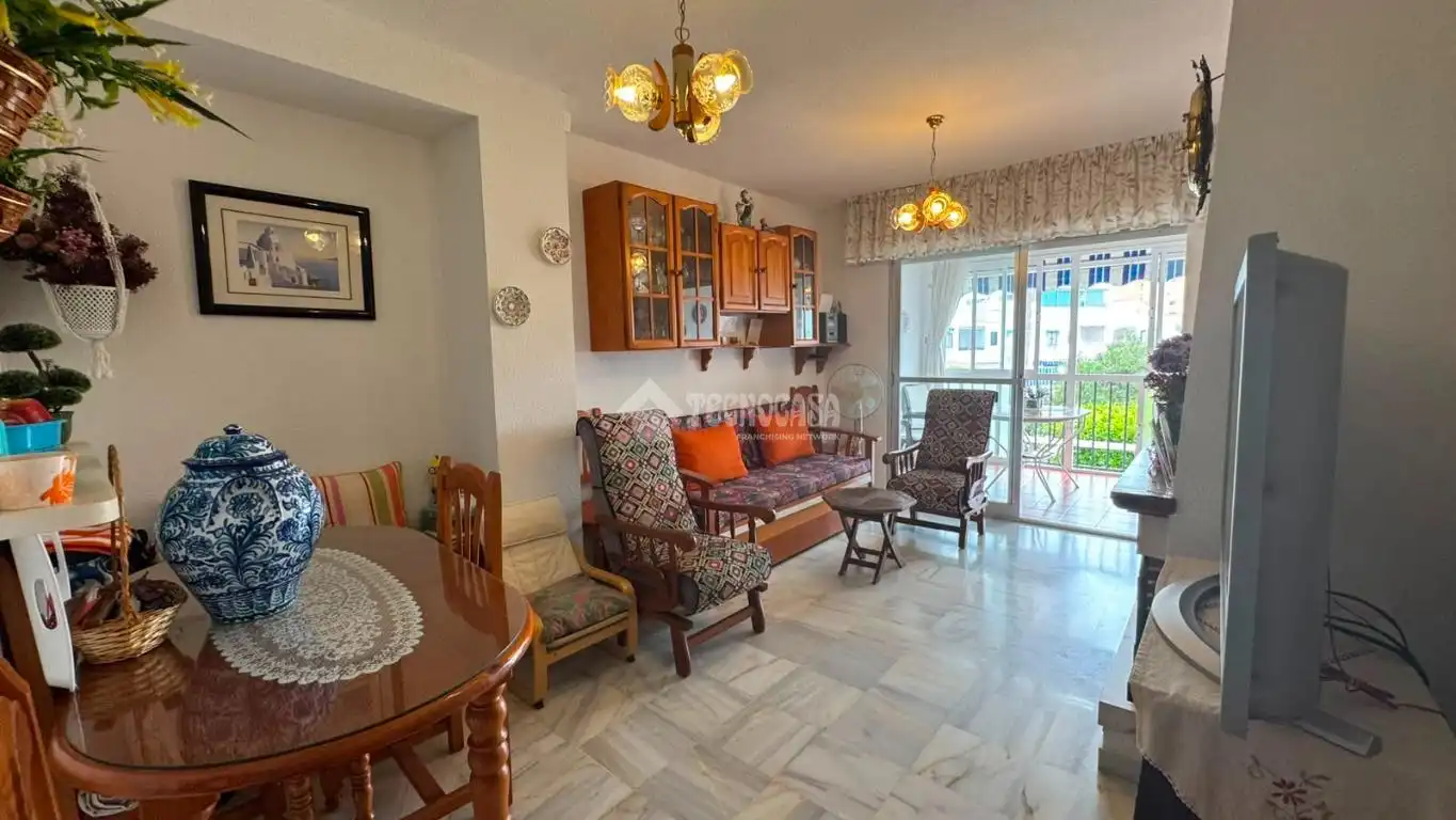 Sala de estar de Dúplex en venta en Motril con Terraza, Piscina y Piscina comunitaria