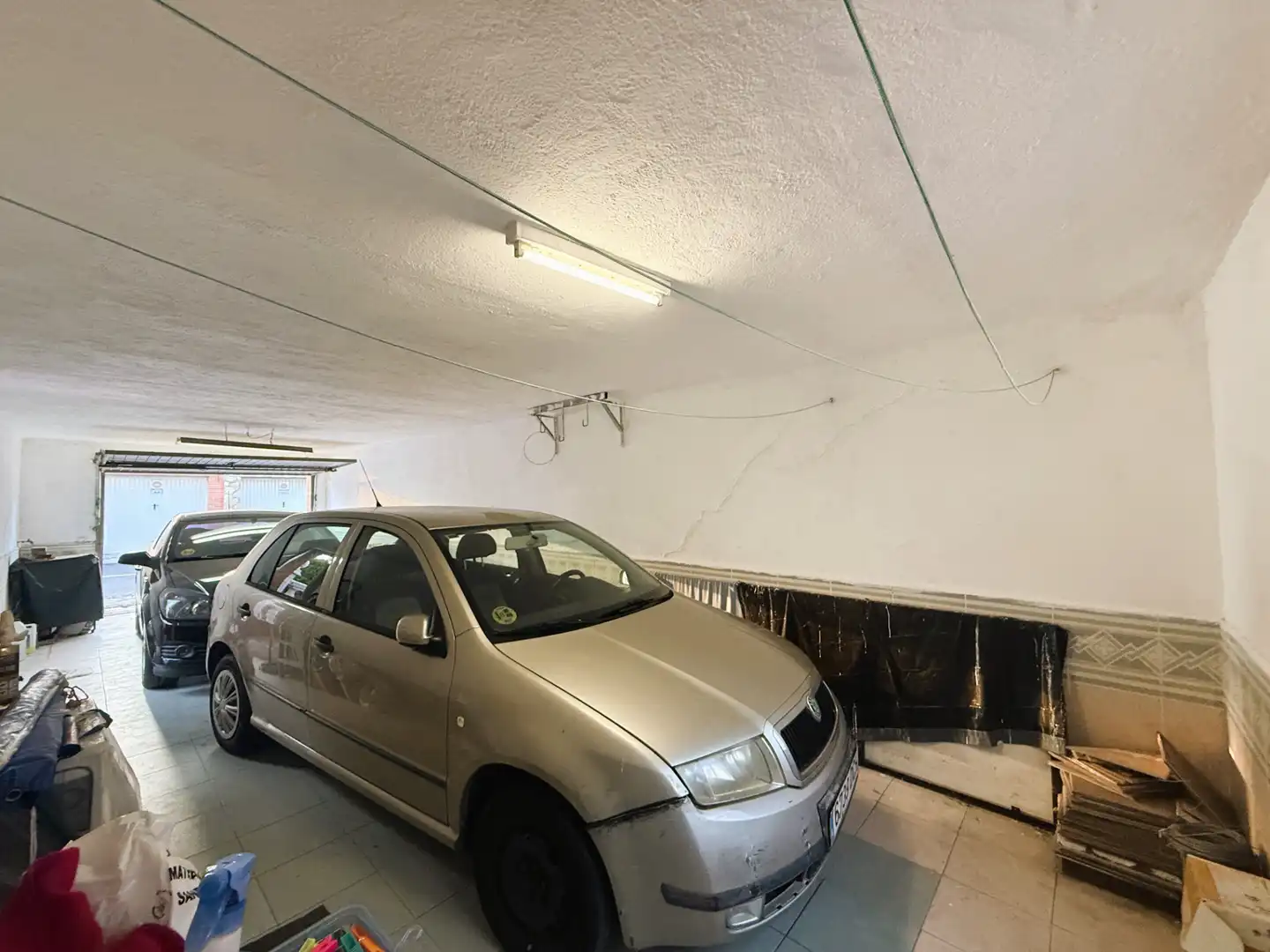 Aparcament de Casa adosada en venda en Coslada amb Calefacció, Jardí privat i Terrassa