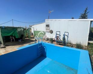 Swimming pool of Country house for sale in Utrera  with Air Conditioner and Heating