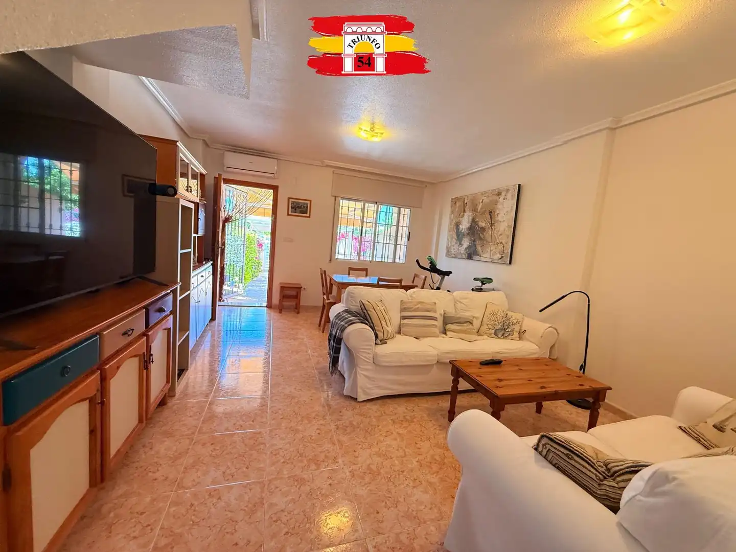 Sala de estar de Casa o chalet en venta en Pilar de la Horadada con Aire acondicionado, Jardín privado y Amueblado