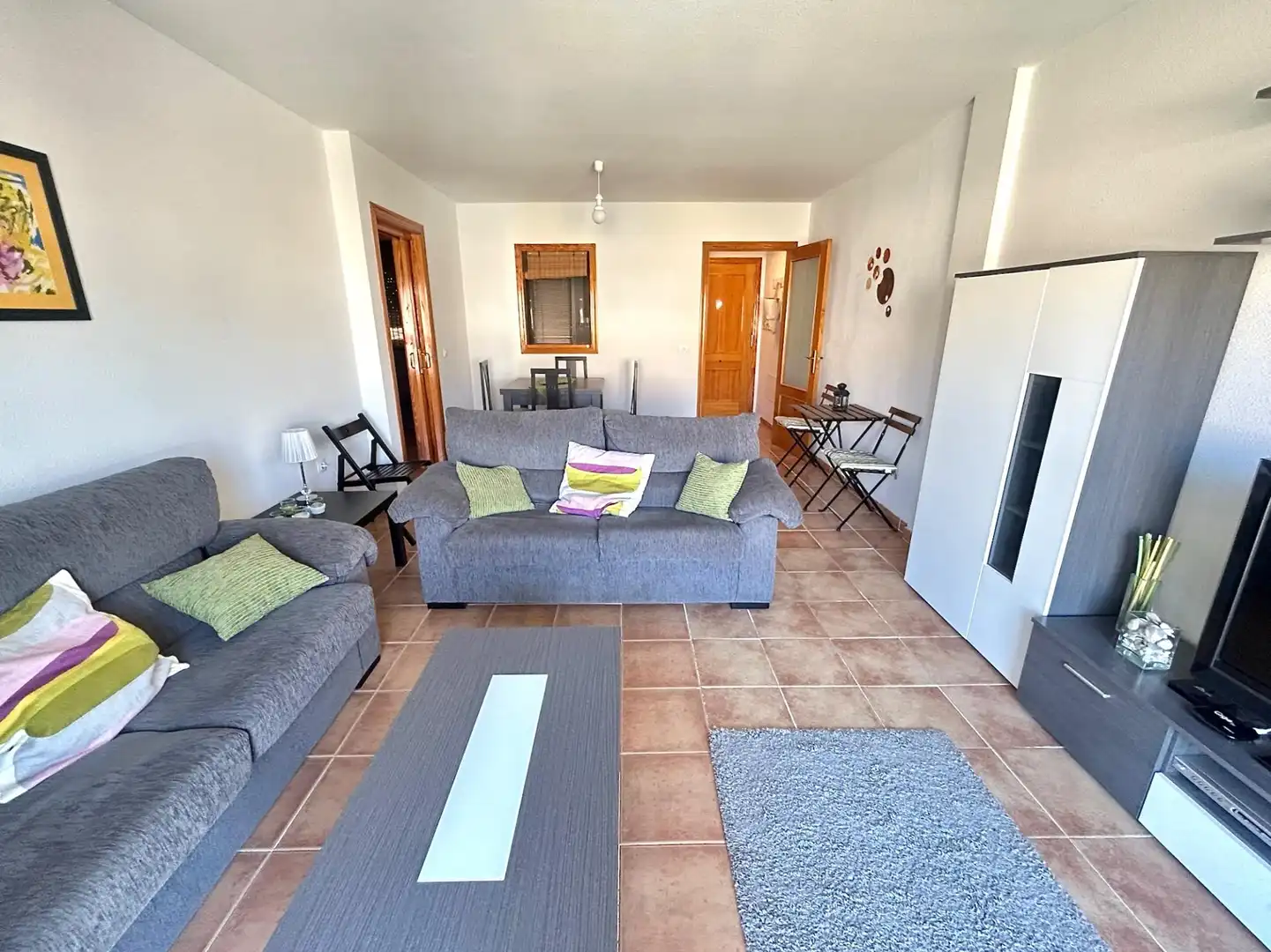 Sala de estar de Piso en venta en Roquetas de Mar con Terraza, Amueblado y Piscina comunitaria