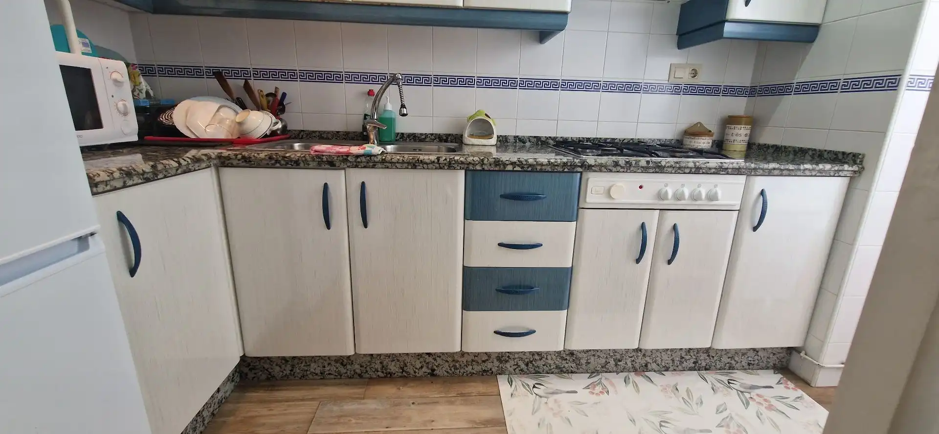 Cuina de Apartament de lloguer en El Portil amb Moblat i Piscina comunitària