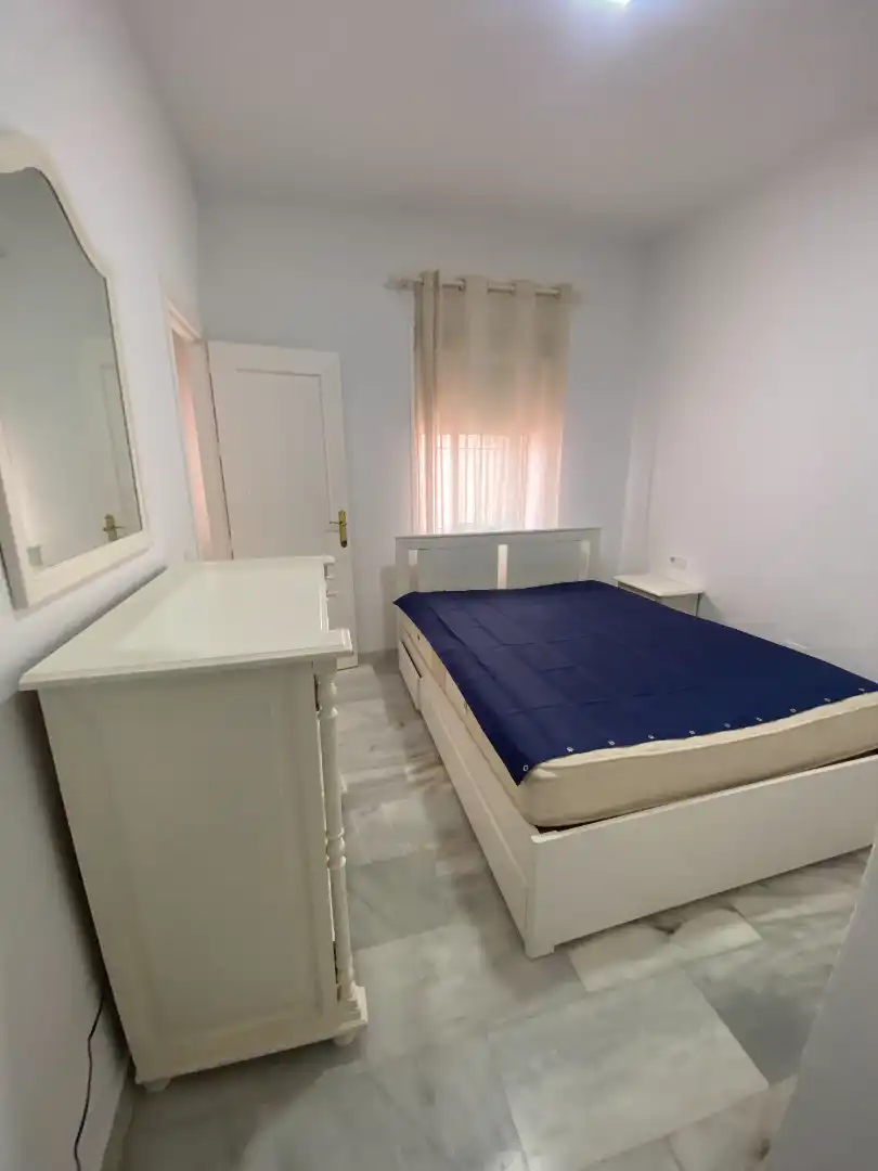 Dormitori de Apartament de lloguer en Málaga amb Aire condicionat, Moblat i Rentadora