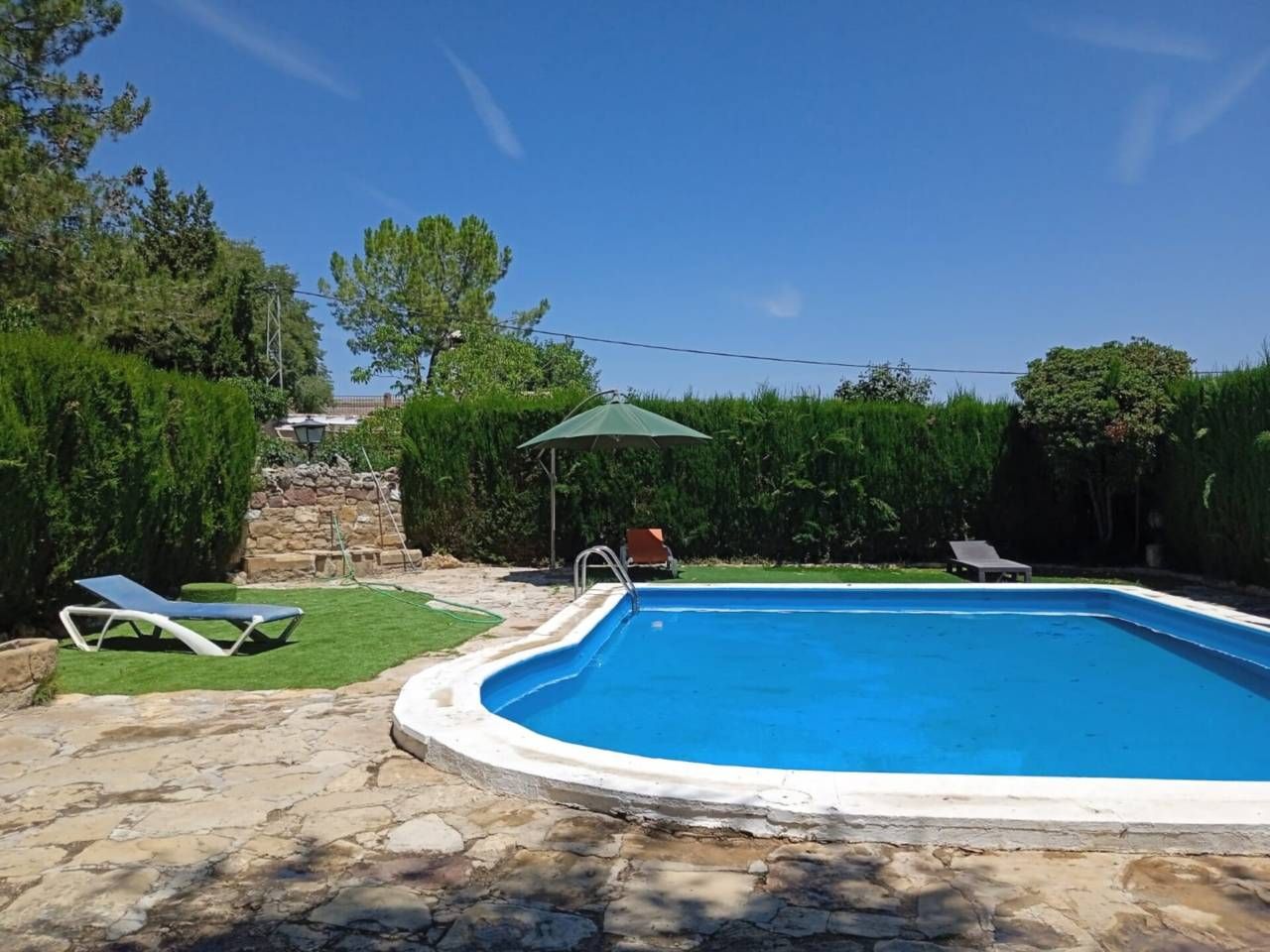 Swimming pool of House or chalet for sale in Úbeda  with Air Conditioner, Heating and Private garden