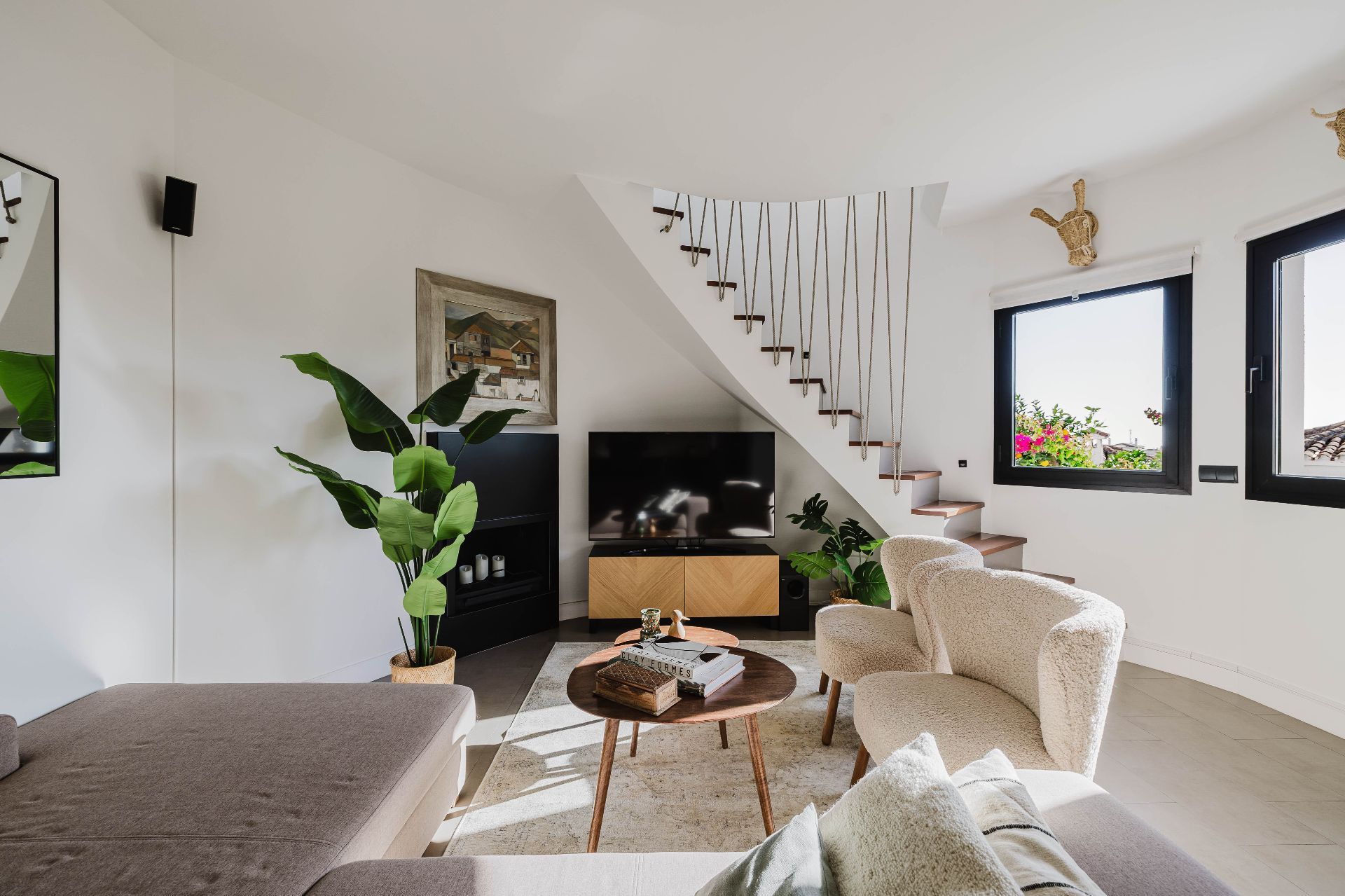 Sala d'estar de Casa adosada en venda en Benalmádena amb Aire condicionat, Jardí privat i Terrassa