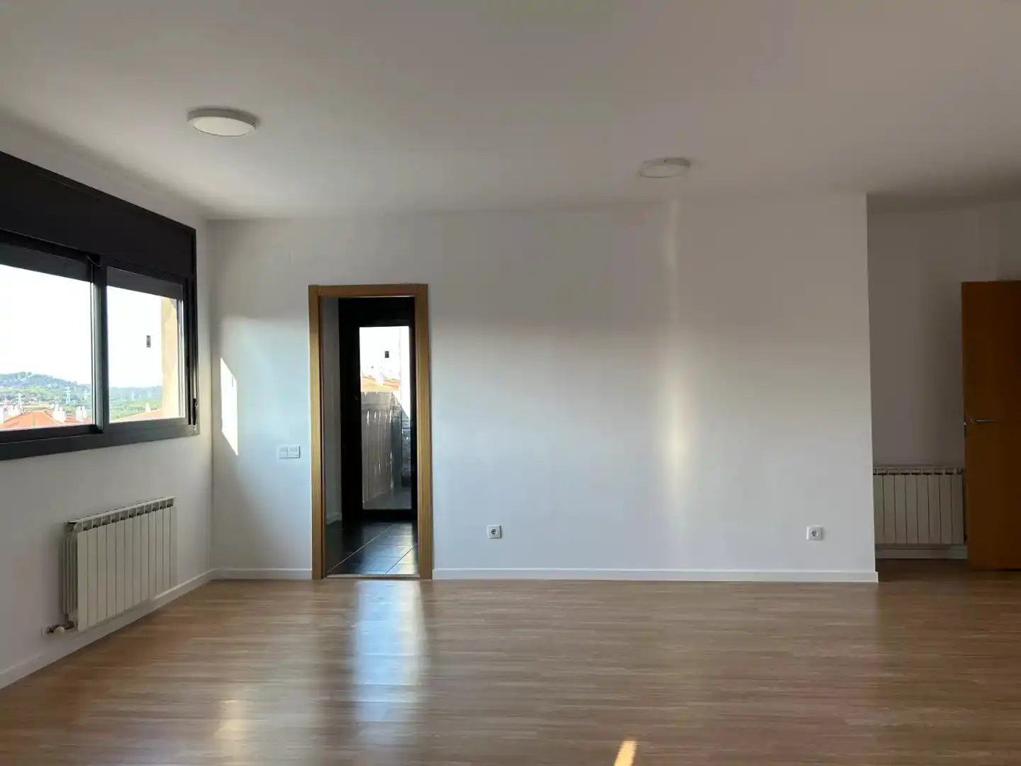 Living room of Flat for sale in Hostalric  with Parquet flooring, Terrace and Storage room