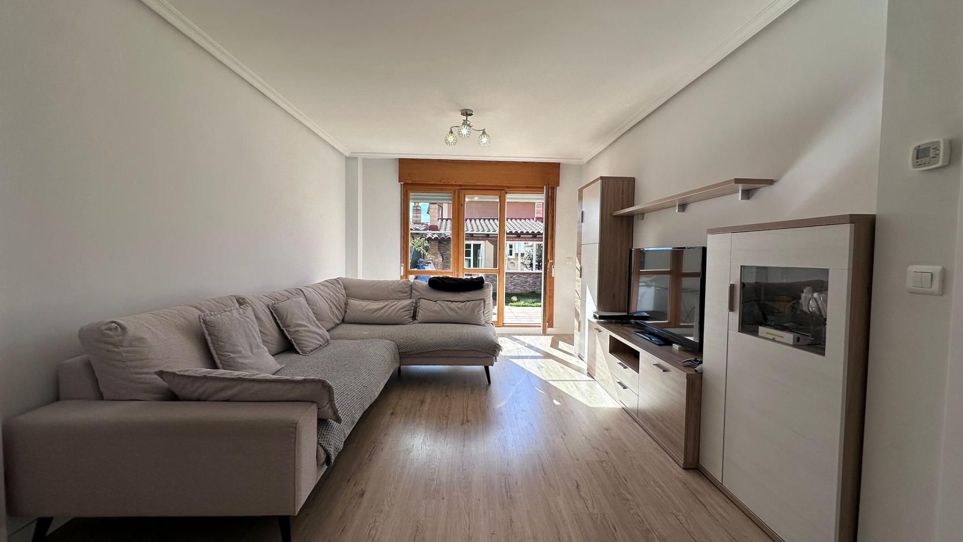 Sala de estar de Casa adosada en venta en Golmayo con Calefacción, Jardín privado y Terraza