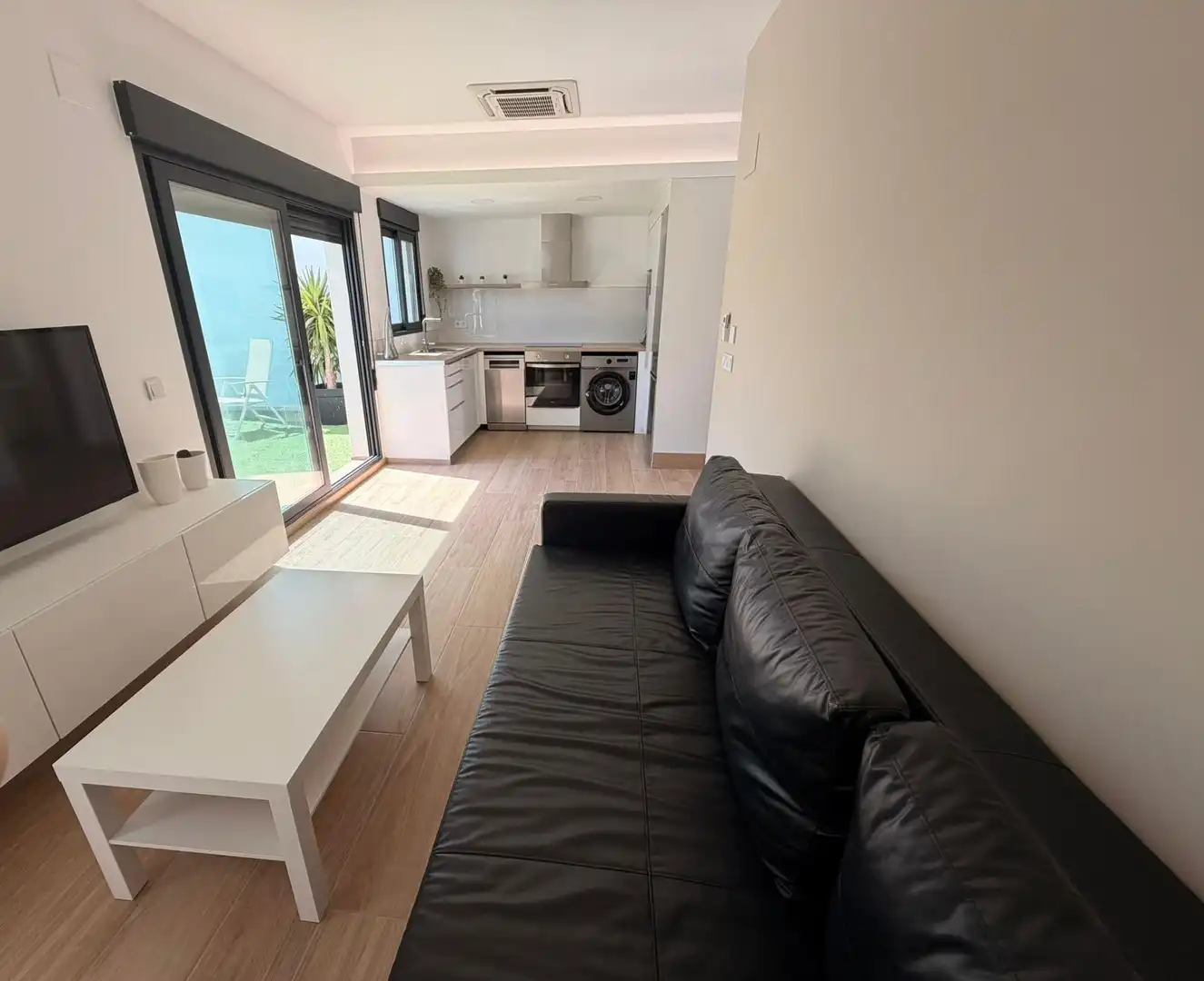 Wohnzimmer von Einfamilien-Reihenhaus zur Miete in Cullera mit Klimaanlage, Heizung und Terrasse
