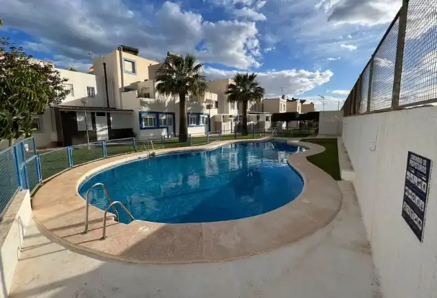Swimming pool of Detached homes for sale in Roquetas de Mar  with Terrace and Community pool