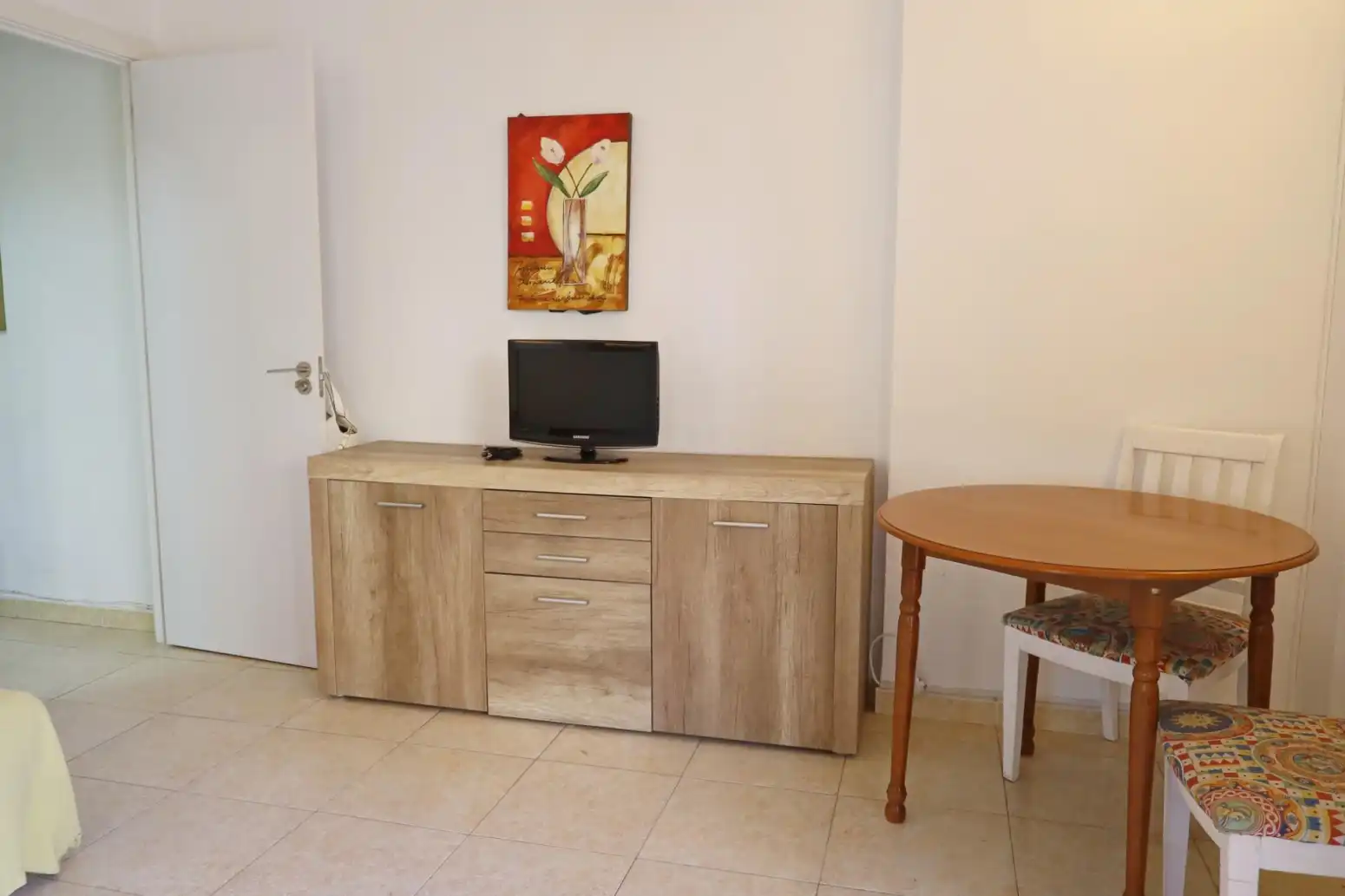 Sala de estar de Piso en venta en Benalmádena con Jardín privado, Terraza y Amueblado