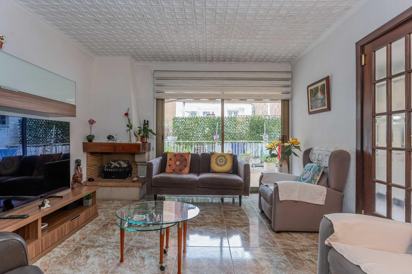 Living room of House or chalet for sale in L'Hospitalet de Llobregat  with Air Conditioner, Heating and Private garden