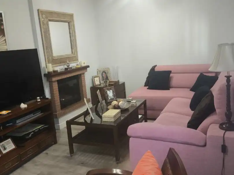 Sala de estar de Casa adosada en venta en Chiclana de la Frontera con Aire acondicionado, Calefacción y Parquet