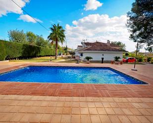 Piscina de Casa o xalet en venda en Busot amb Jardí privat, Terrassa i Traster