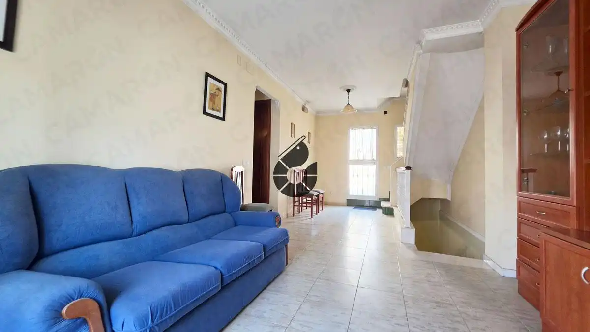 Sala d'estar de Casa adosada en venda en Coria del Río amb Terrassa i Traster