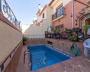 Swimming pool of House or chalet for sale in  Granada Capital  with Air Conditioner, Heating and Parquet flooring