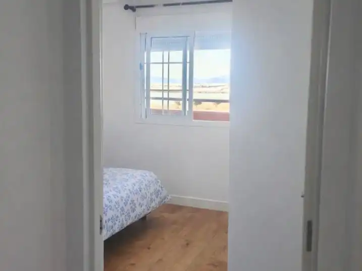 Schlafzimmer von Wohnungen zum Verkauf in Roquetas de Mar mit Klimaanlage und Terrasse