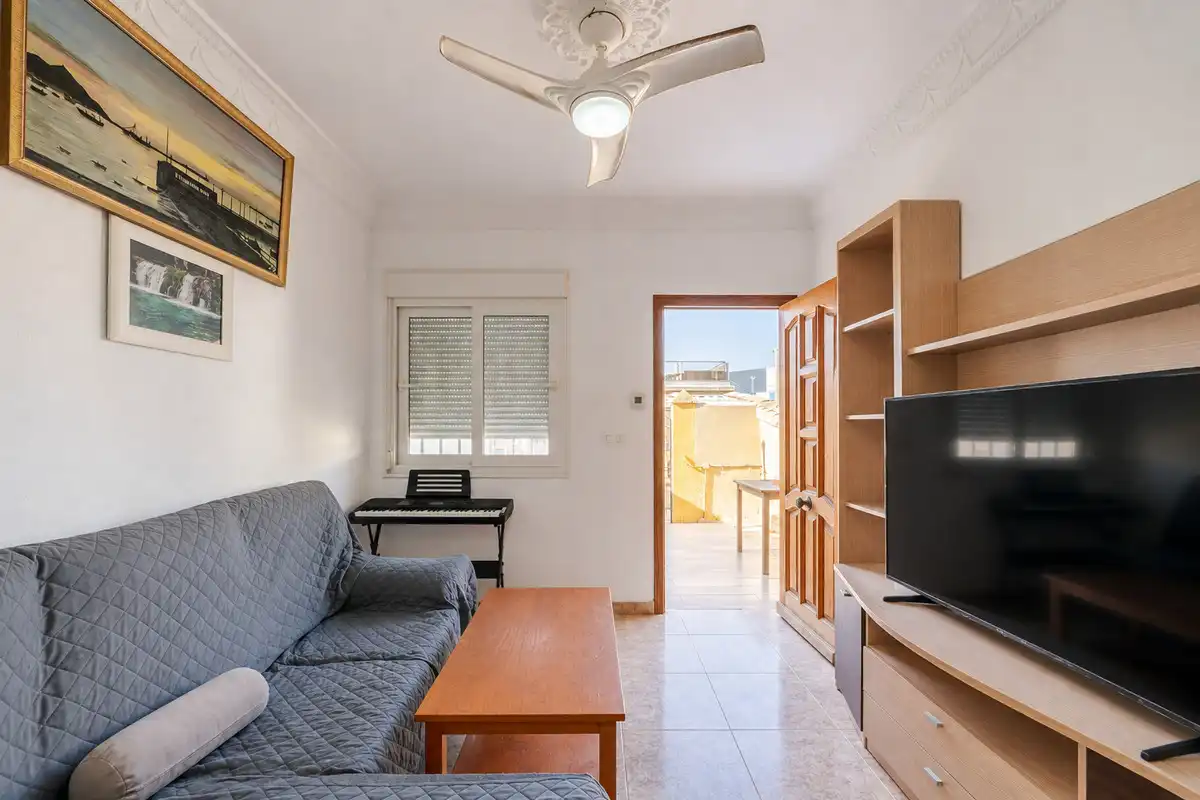 Sala de estar de Casa adosada en venta en Torrevieja con Aire acondicionado, Calefacción y Jardín privado