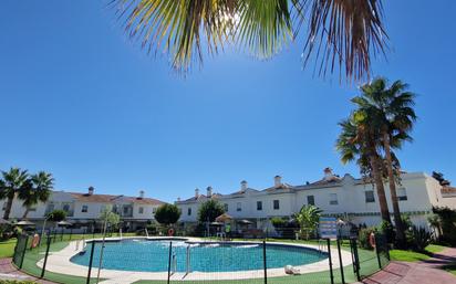 Exterior view of Single-family semi-detached for sale in El Portil  with Terrace, Furnished and Community pool