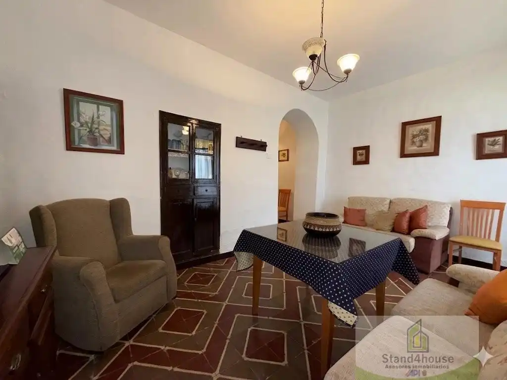 Sala d'estar de Casa adosada en venda en Gibraleón amb Terrassa i Traster