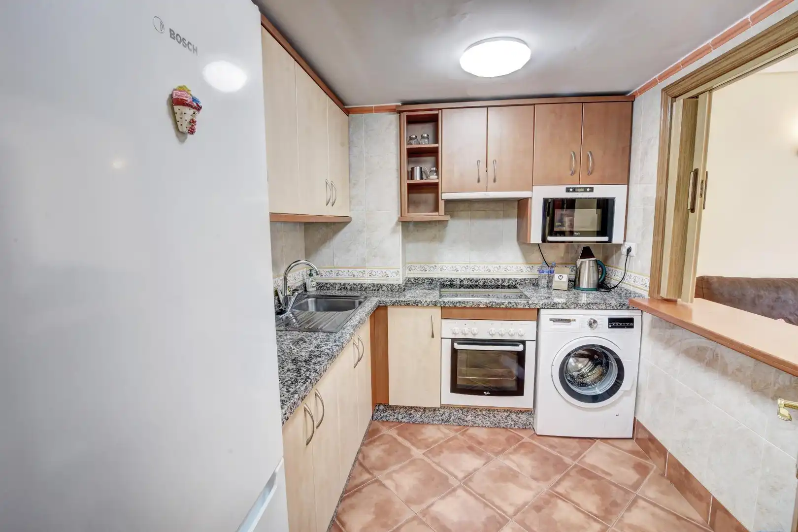Cuina de Apartament en venda en Benalmádena amb Aire condicionat, Terrassa i Piscina comunitària