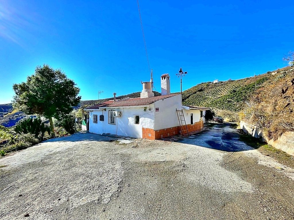 Exterior view of Country house for sale in Macharaviaya  with Private garden, Terrace and Furnished