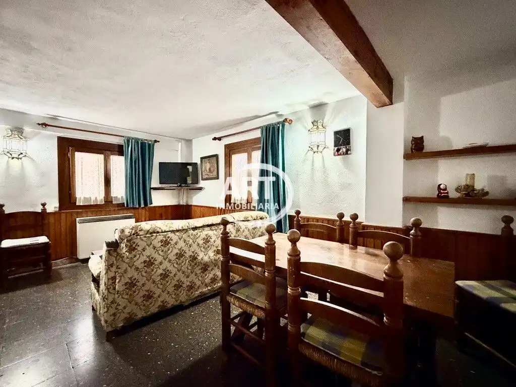 Sala d'estar de Finca rústica en venda en Alcalá de la Selva amb Calefacció i Moblat