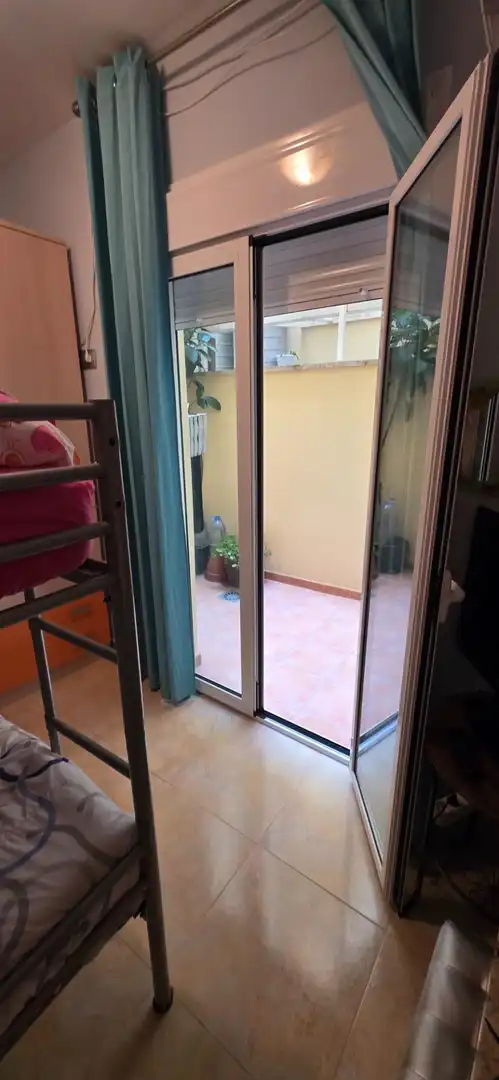 Schlafzimmer von Erdgeschoss zum Verkauf in L'Ampolla mit Klimaanlage, Terrasse und Möbliert