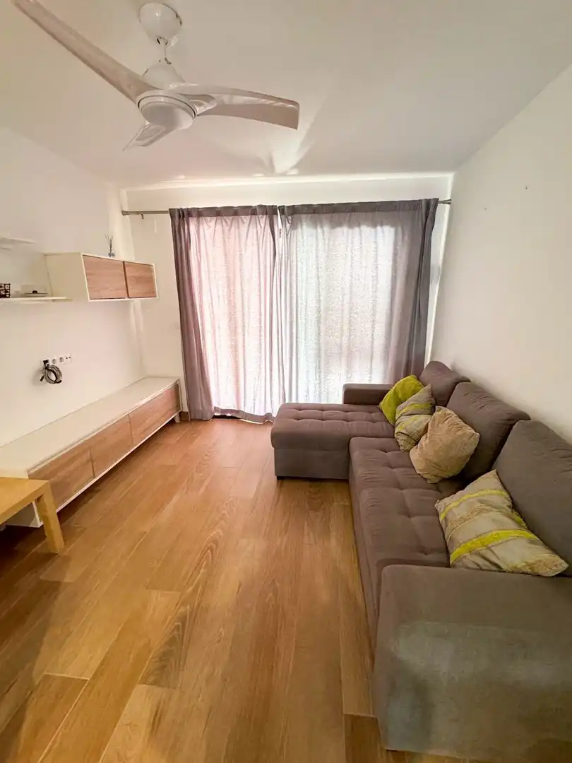 Wohnzimmer von Einfamilien-Reihenhaus zur Miete in Orihuela mit Klimaanlage, Schwimmbad und Gemeinschaftspool