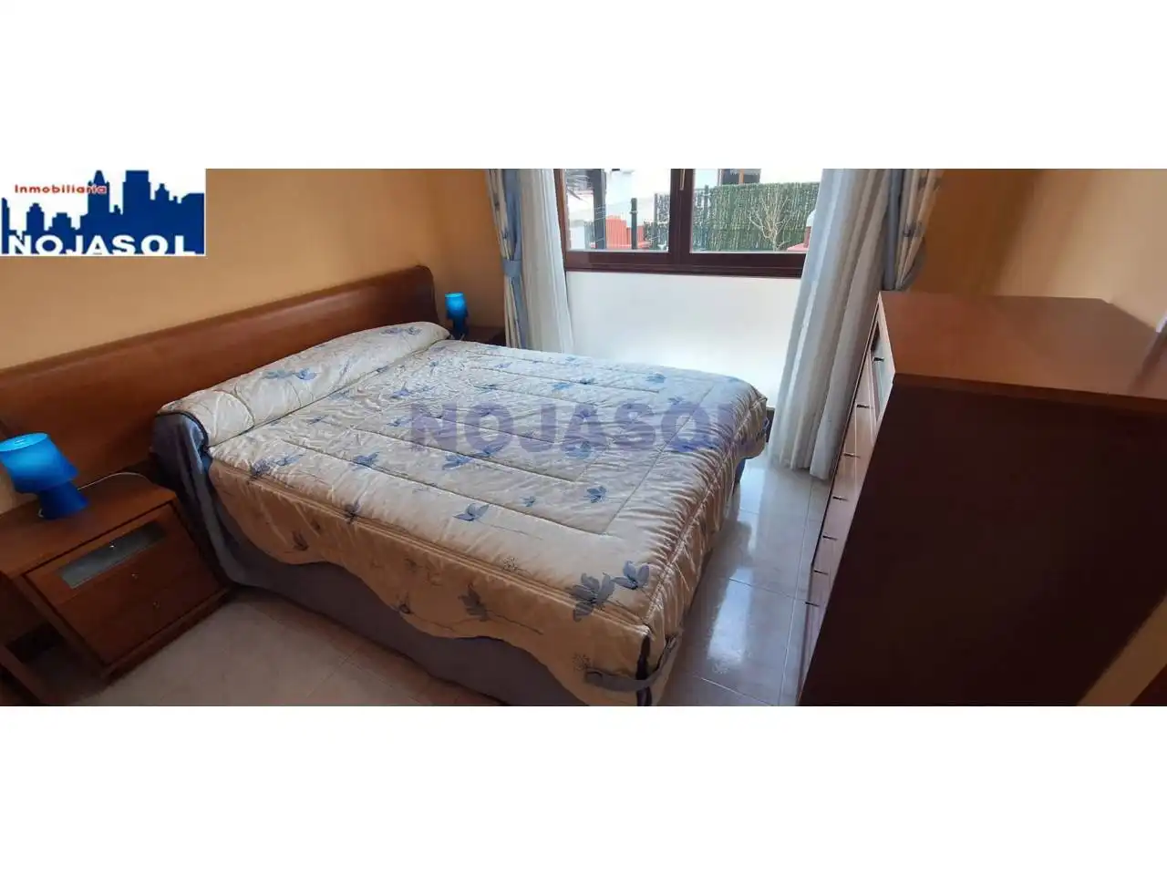 Dormitori de Apartament de lloguer en Noja amb Calefacció, Jardí privat i Terrassa