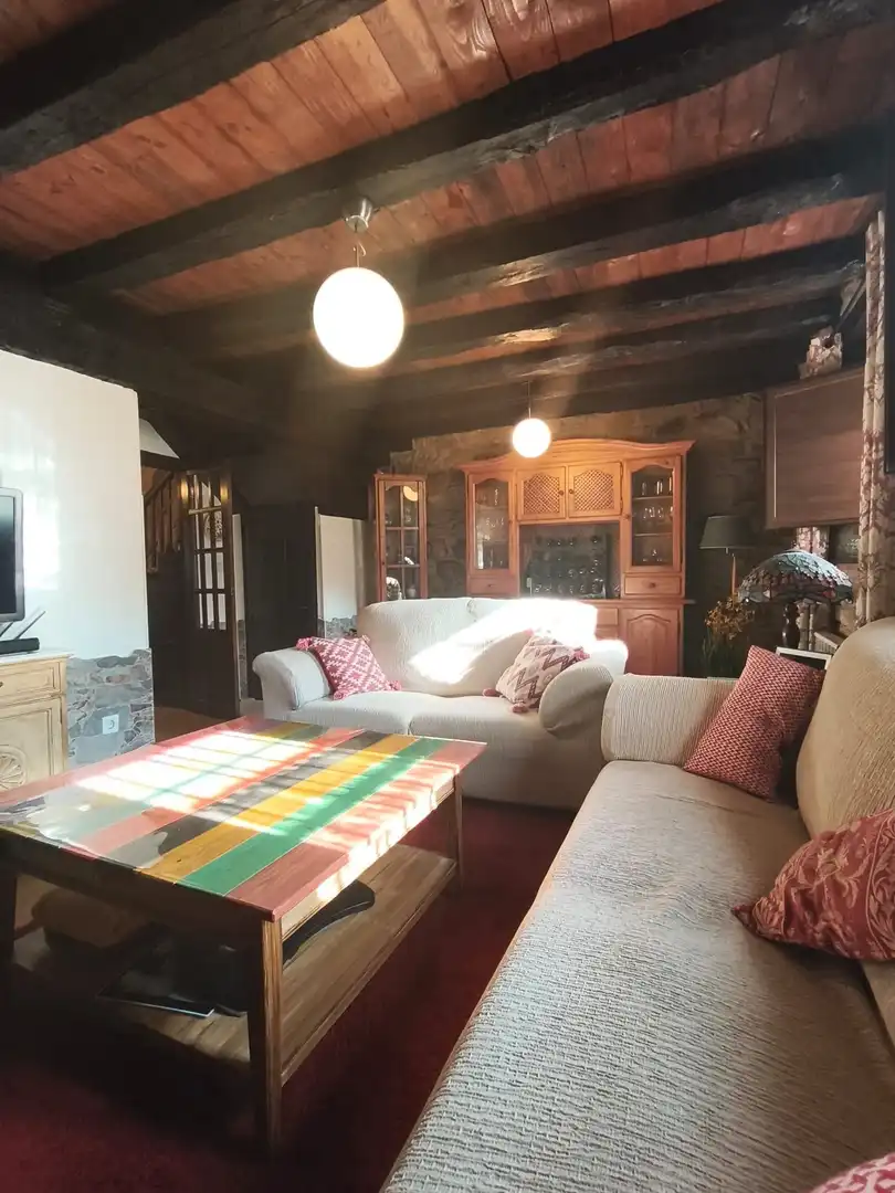 Sala de estar de Casa adosada en venta en Luena  con Calefacción y Jardín privado