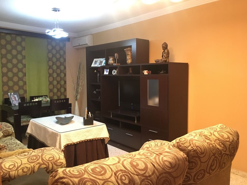 Living room of Flat for sale in Bollullos Par del Condado  with Air Conditioner, Heating and Terrace