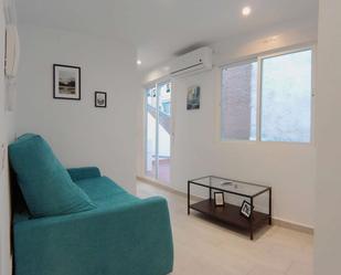 Living room of Study to share in  Madrid Capital  with Air Conditioner and Terrace