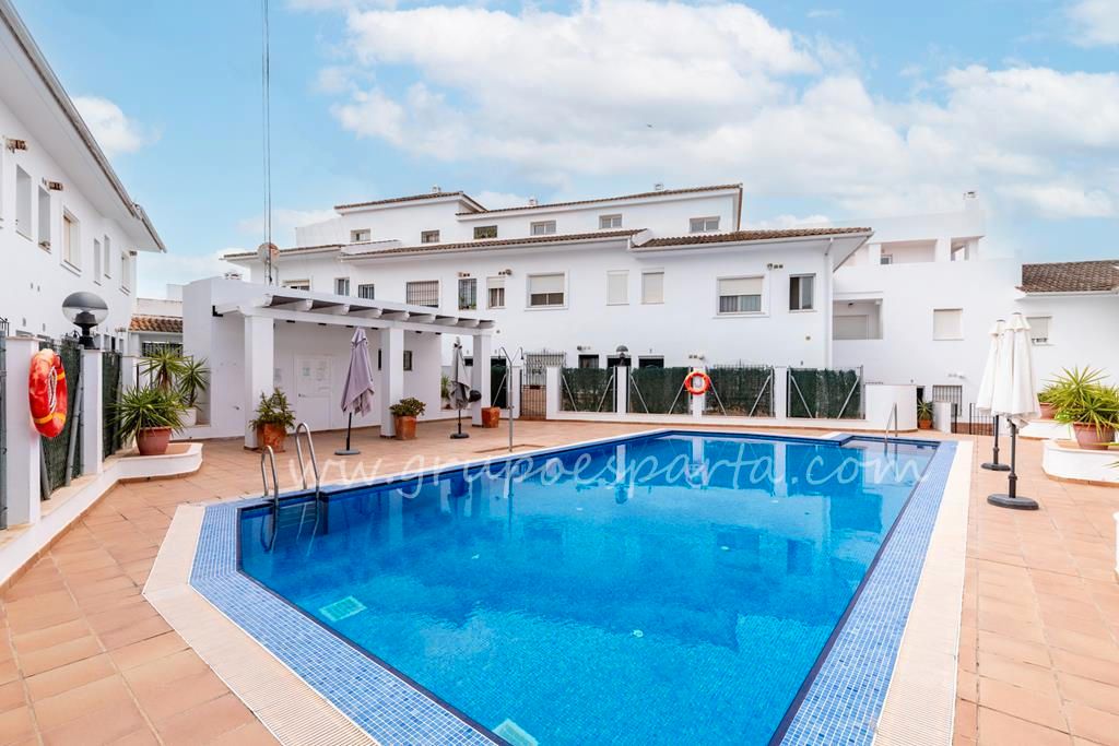 Swimming pool of Duplex for sale in Sanlúcar la Mayor  with Air Conditioner, Storage room and Community pool