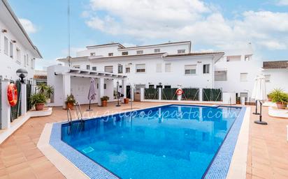 Swimming pool of Duplex for sale in Sanlúcar la Mayor  with Air Conditioner, Storage room and Community pool